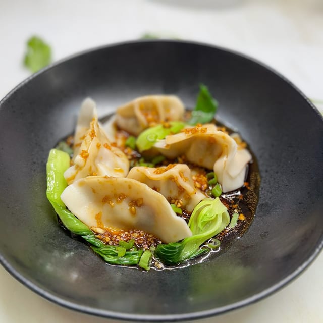 Handmade Dumplings In Spicy Garlic Sauce.